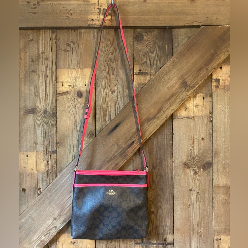 Coach crossbody!! Dark brown with hot pink! Never used!!